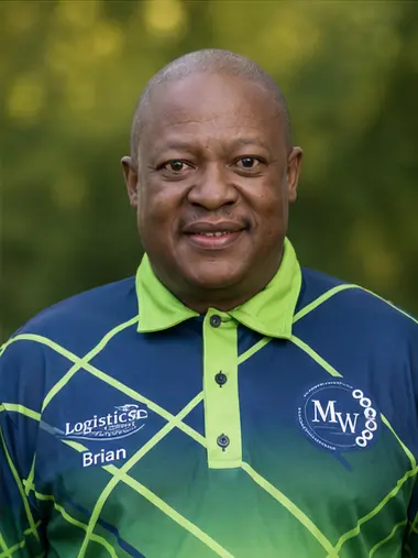 MetsonWorld Logistics driver in a branded blue and green shirt